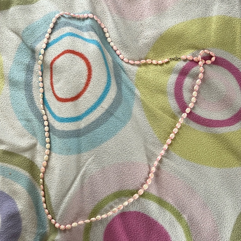 Long pink and white necklace